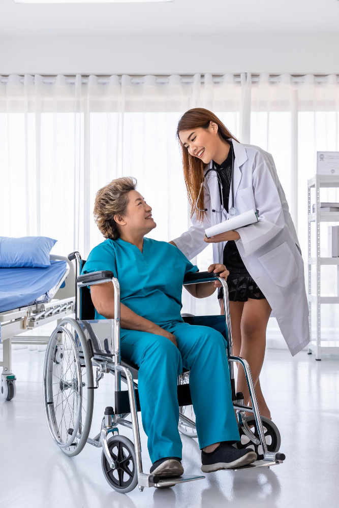 Medical doctor caring for a senior woman in a wheelchair